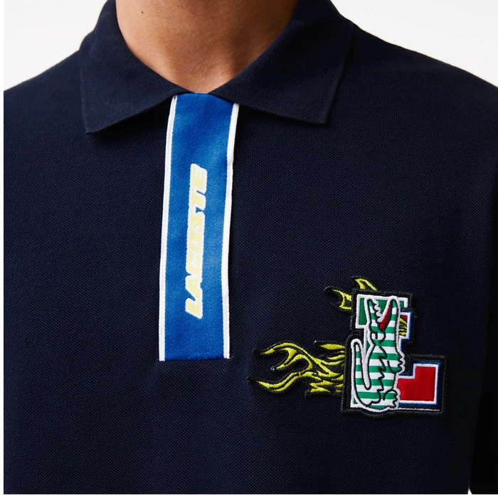 Koszulka polo męska Lacoste z kontrastowym zapieciem granatowa r. L