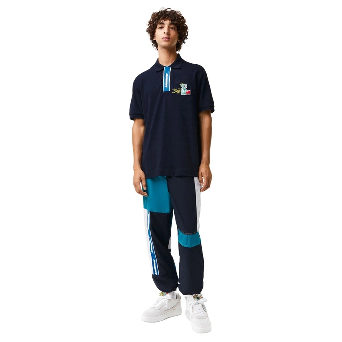 Koszulka polo męska Lacoste z kontrastowym zapieciem granatowa r. XS